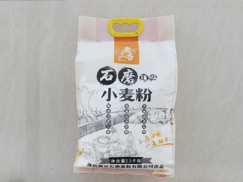 四边封带手提孔袋